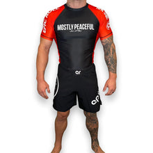 Load image into Gallery viewer, Mostly Peaceful Rash Guard
