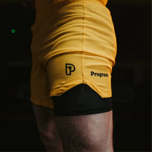 Lade das Bild in den Galerie-Viewer, Fortschrittsprofil Hybrid-Shorts- Gold gelb
